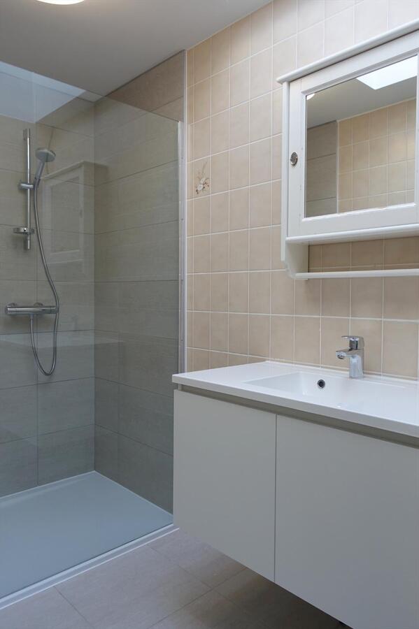 Gezellige half-open woning met zonnige tuin 