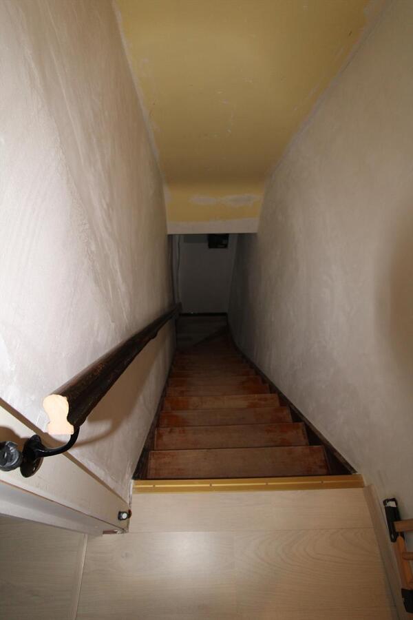 Welgelegen, comfortabel woonhuis met aangename tuin, nabij winkels 