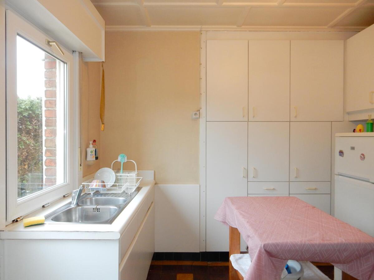 Woning met zonnige tuin en garage 