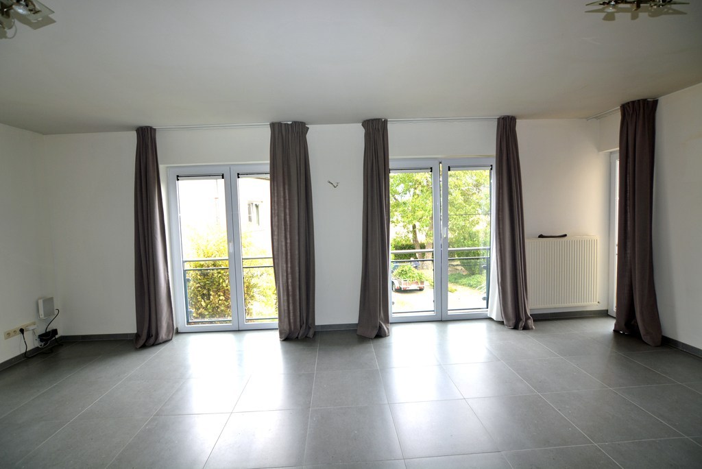Appartement (104 m²) met 2 slpks, garage en kelderberging. 