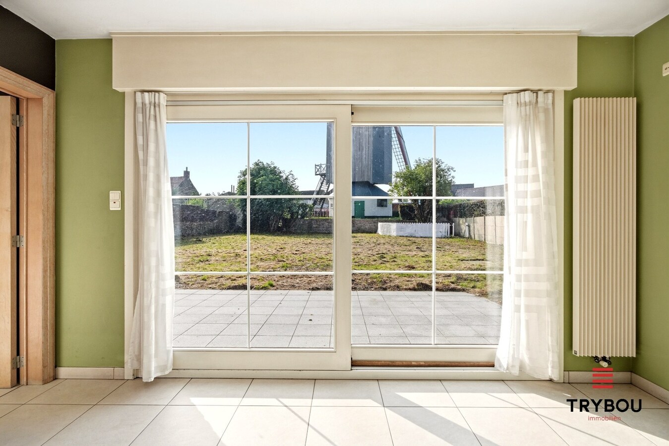 Ruime halfopen woning met 5 slaapkamers te koop in Werken met garage en ruime tuin! 