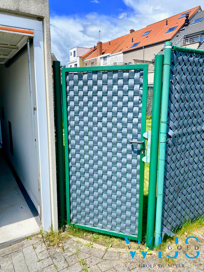 Gelijkvloers appartement met zonnige tuin &amp; dubbele garage te Sint-Laureins ! 