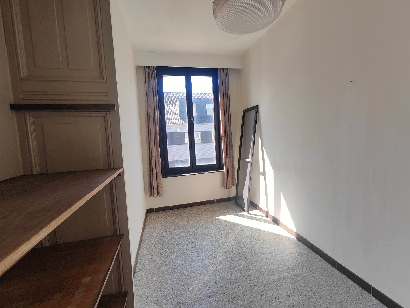 Unieke woning met achterliggende tuin  in het centrum van Pittem 