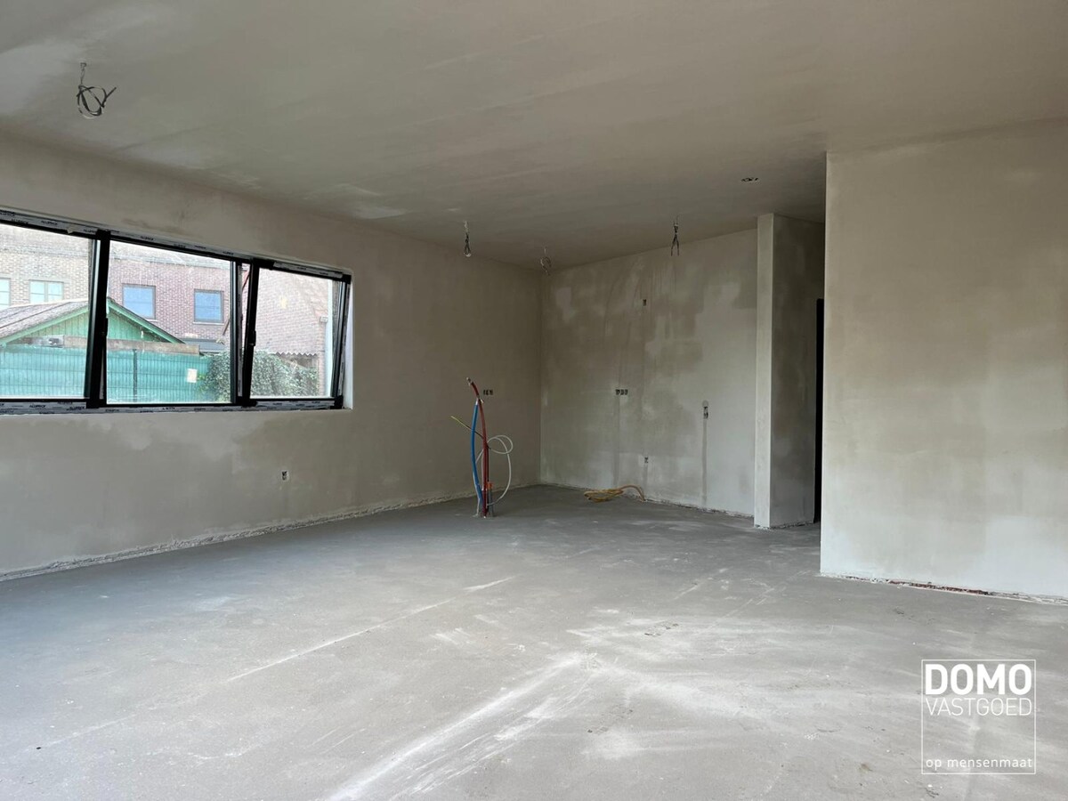 GELIJKVLOERS NIEUWBOUWAPPARTEMENT MET TUIN IN HASSELT 
