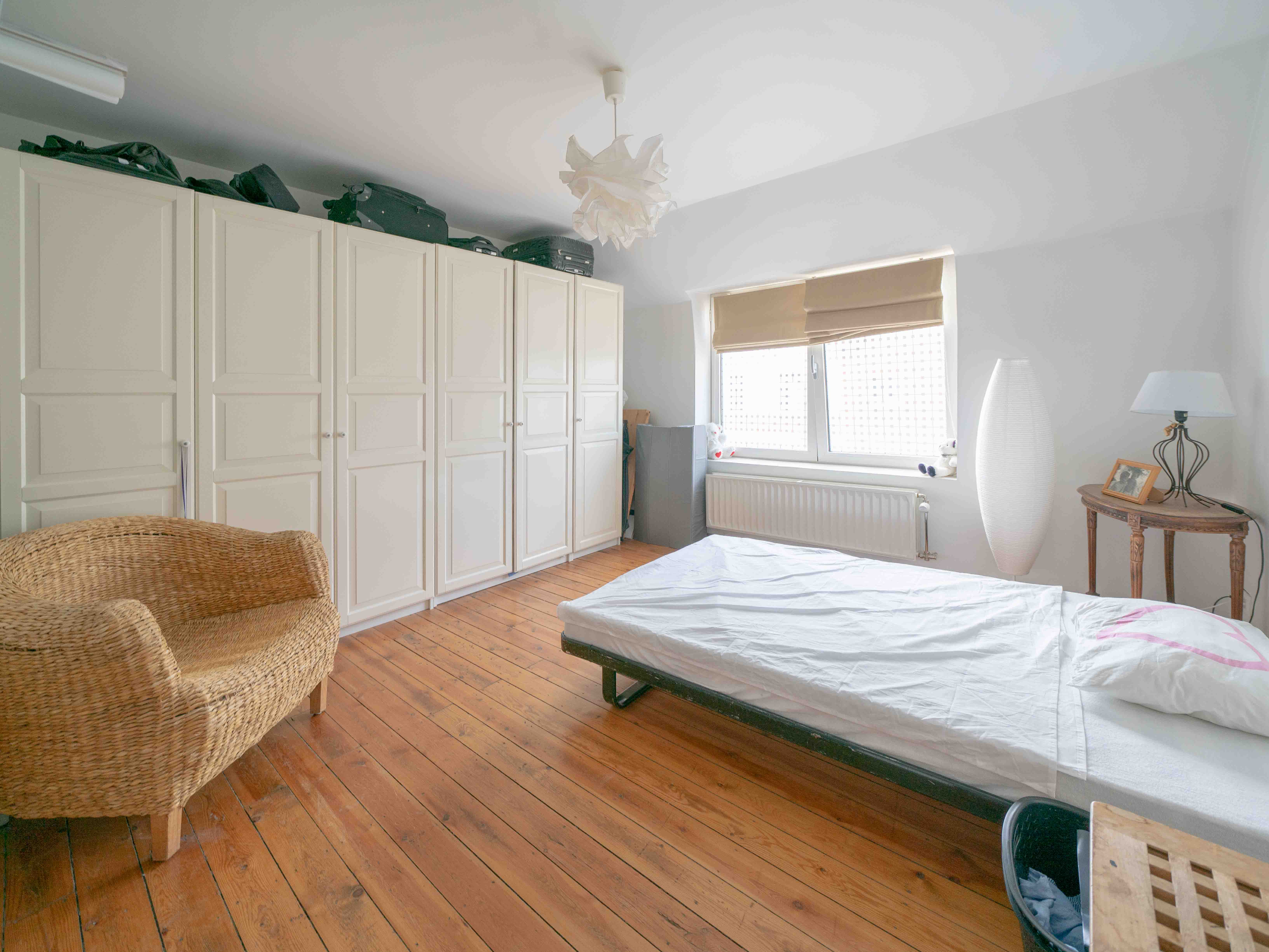 Zeer charmante eengezinswoning + projectgrond voor 2 app. 