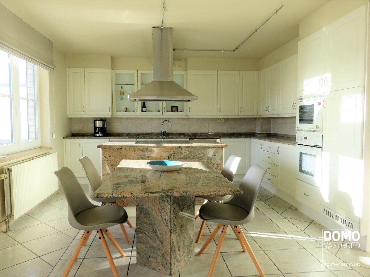 GUNSTIG GELEGEN OPBRENGSTEIGENDOM TE HASSELT 