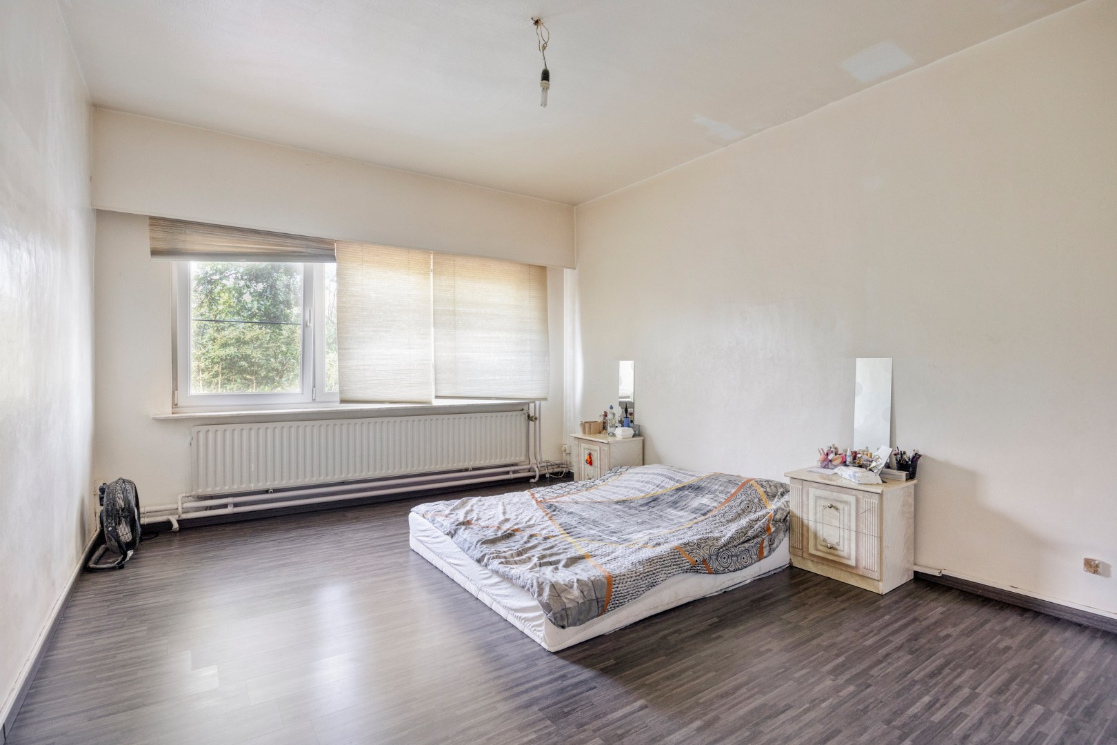 Instapklare woning met 4 à 6 slaapkamers en garage in hartje Leopoldsburg 