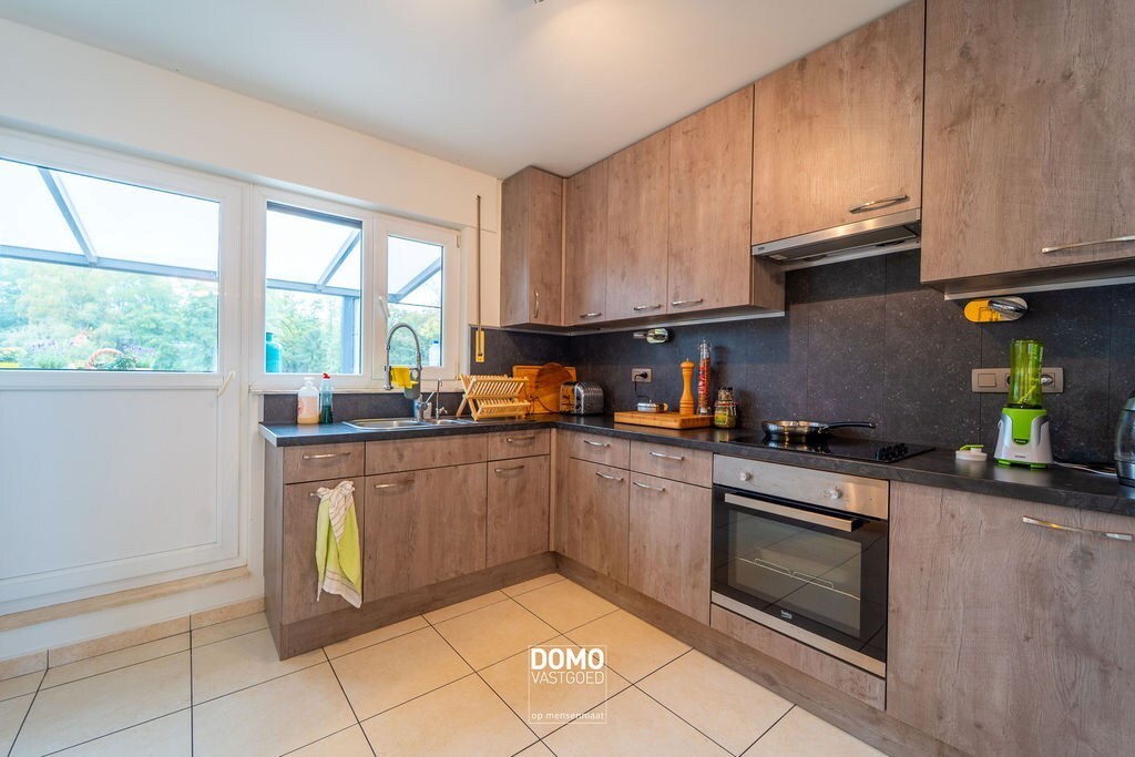 INSTAPKLAAR DUPLEXAPPARTEMENT MET TERRAS EN AUTOSTANDPLAATS IN HEUSDEN-ZOLDER 