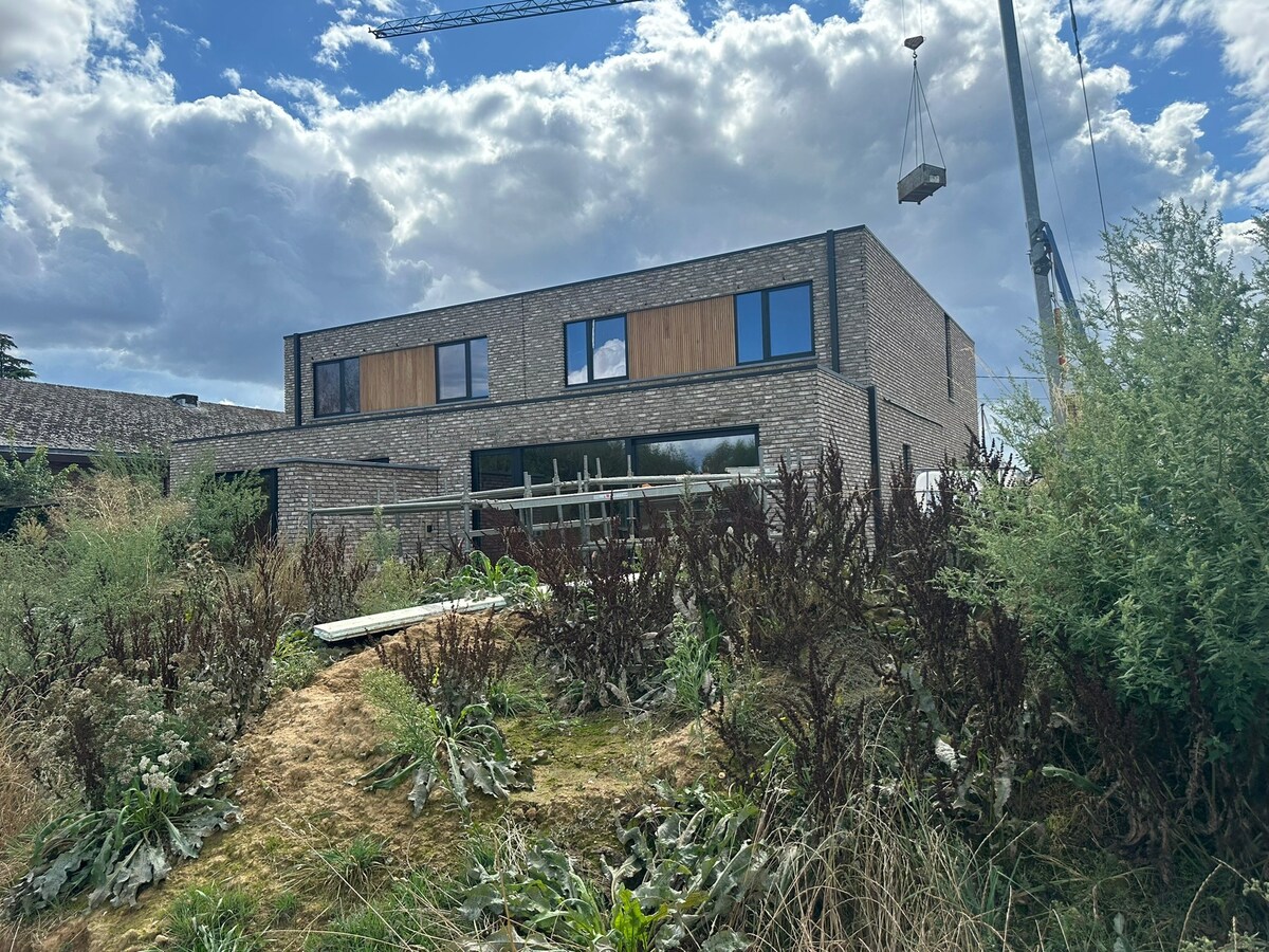 Mijmeren over de velden - in een luxueuze half open nieuwbouwwoning in Rotem 