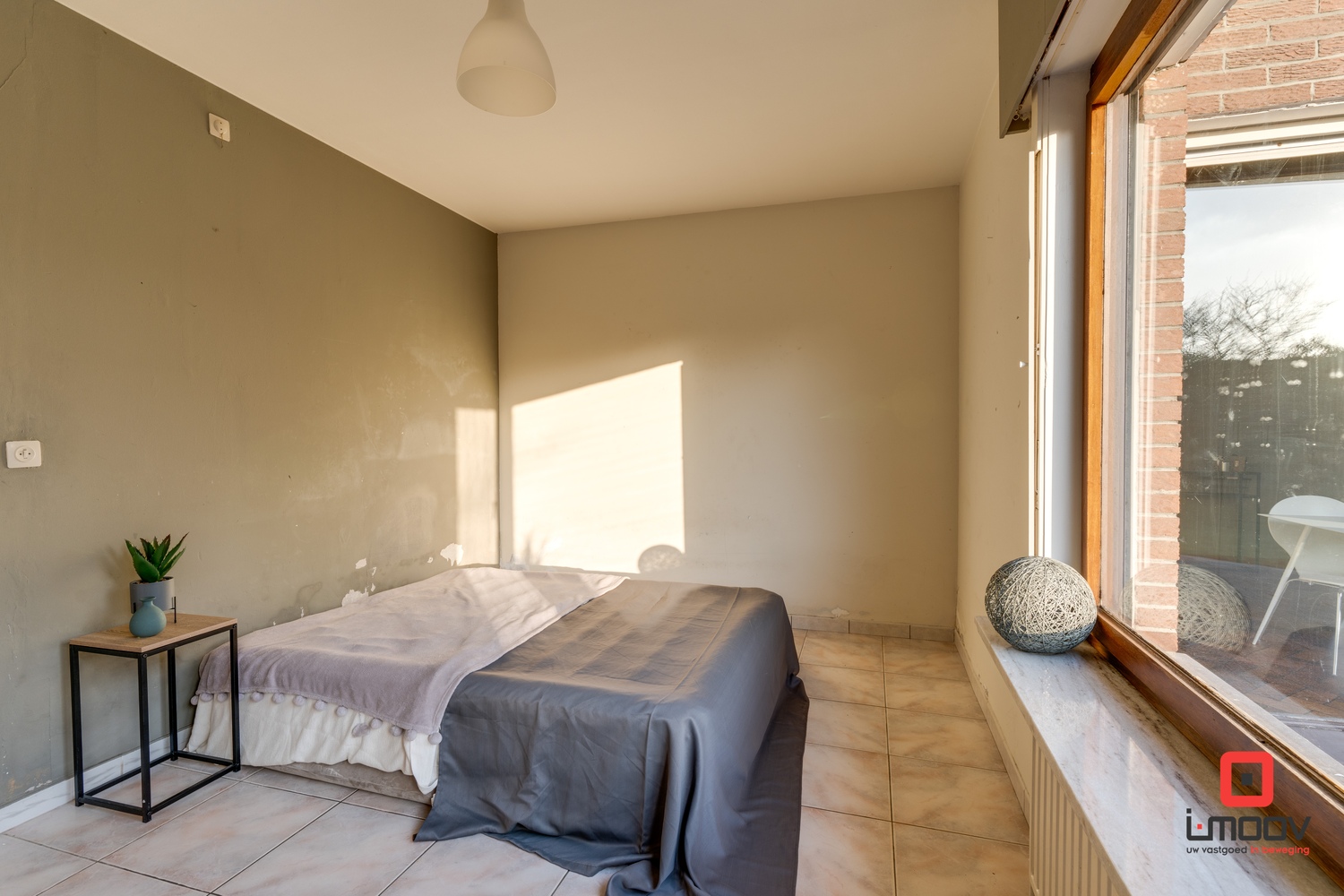 Degelijke woning met tal van mogelijkheden. 