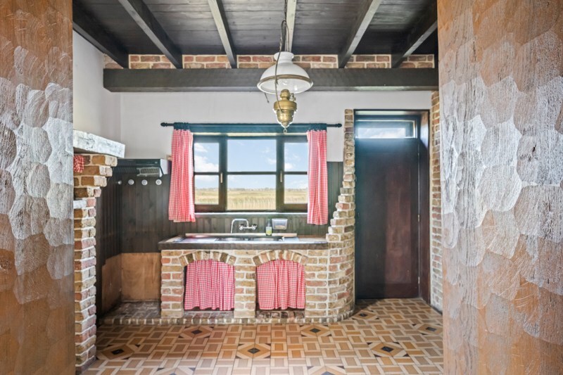 Te renoveren vrijstaande woning met prachtig uitzicht in natuurgebied 