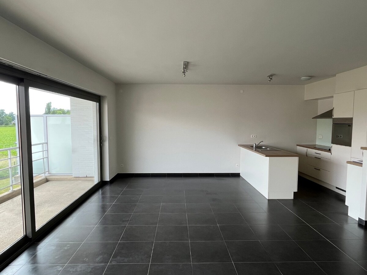 Hoogwaardig, eigentijds appartement met ondergrondse staanplaats 