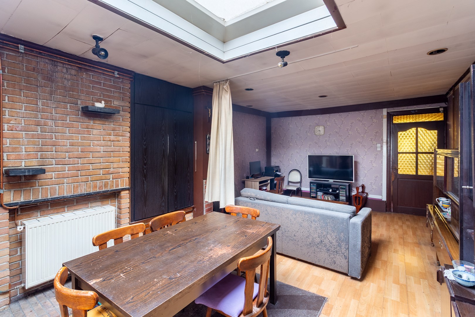 Unieke renovatiewoning met karakter en potentieel in hartje Ledeberg 