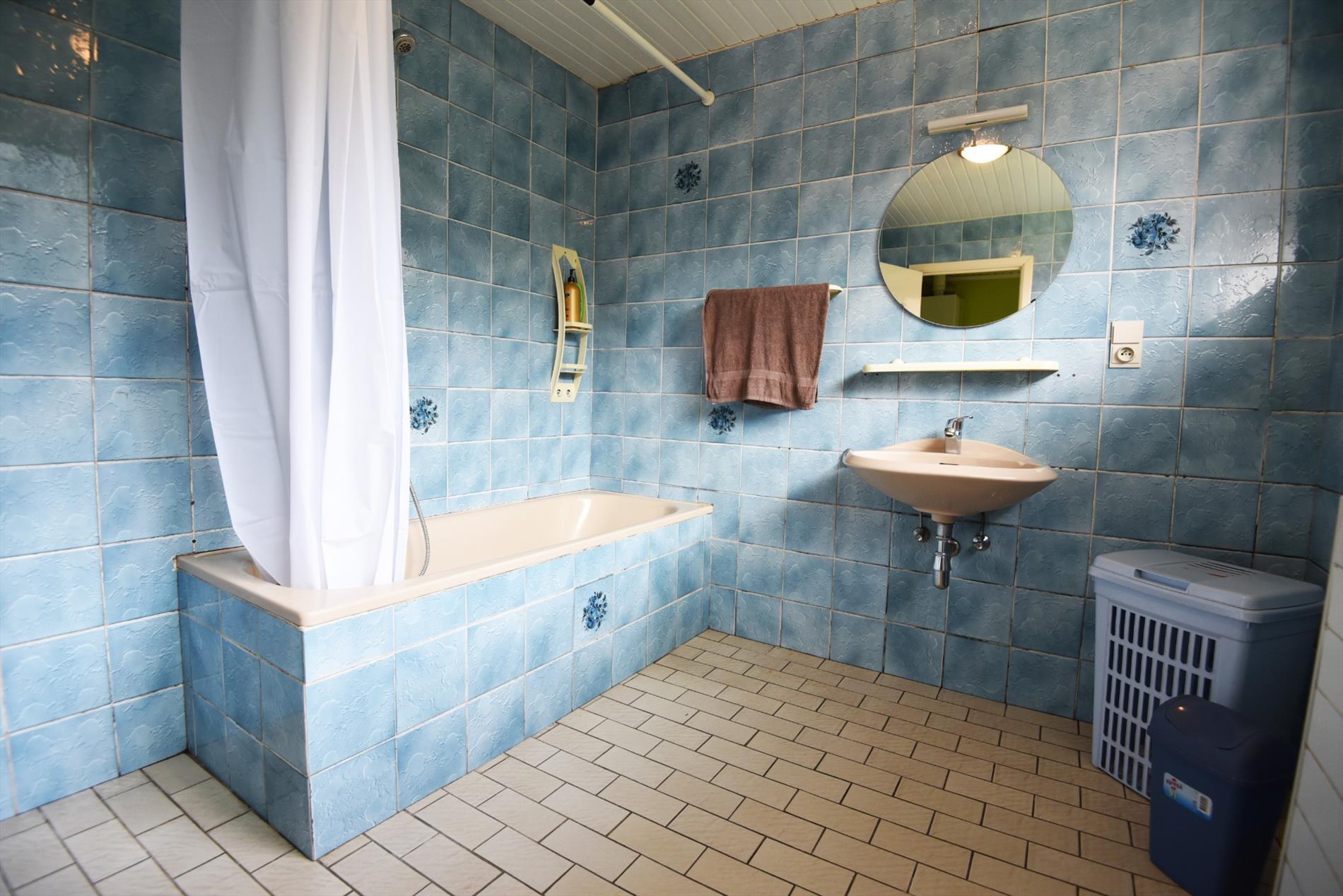 Gezinswoning met 2 slpks (mogelijkheid 3), garage en tuin nabij centrum Maldegem 