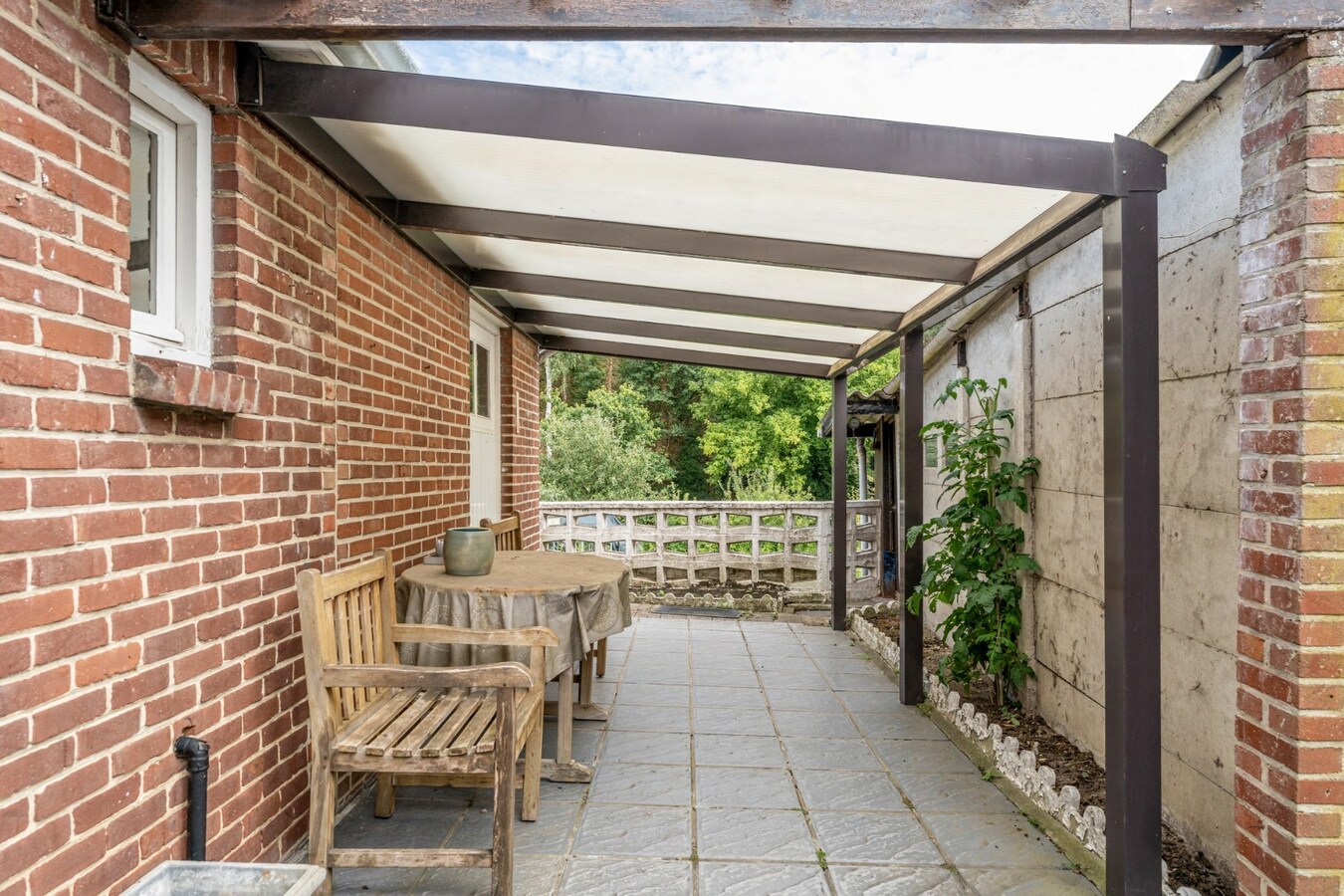 Halfvrijstaande gezinswoning op een ruim perceel van 13a80ca op wandelafstand van het centrum van Opoeteren! 