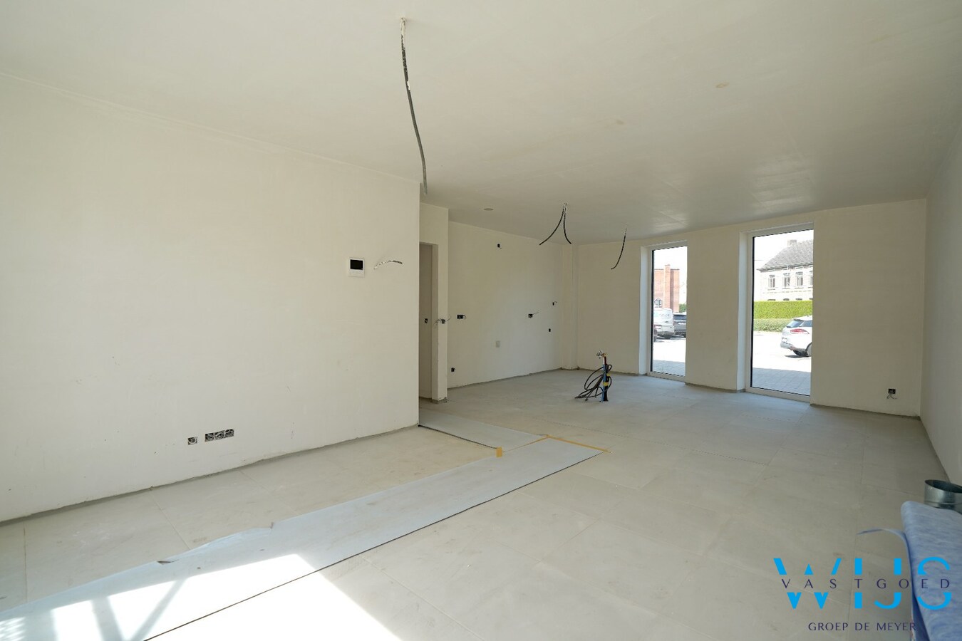 Gelijkvloers nieuwbouwappartement met private inkom en tuin 