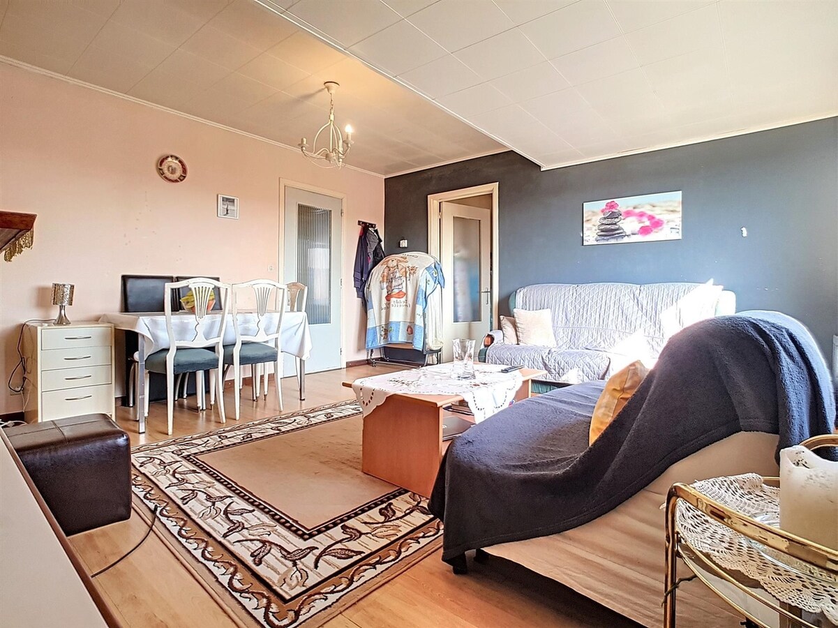 Dakppartement aan het marktplein te Heist 