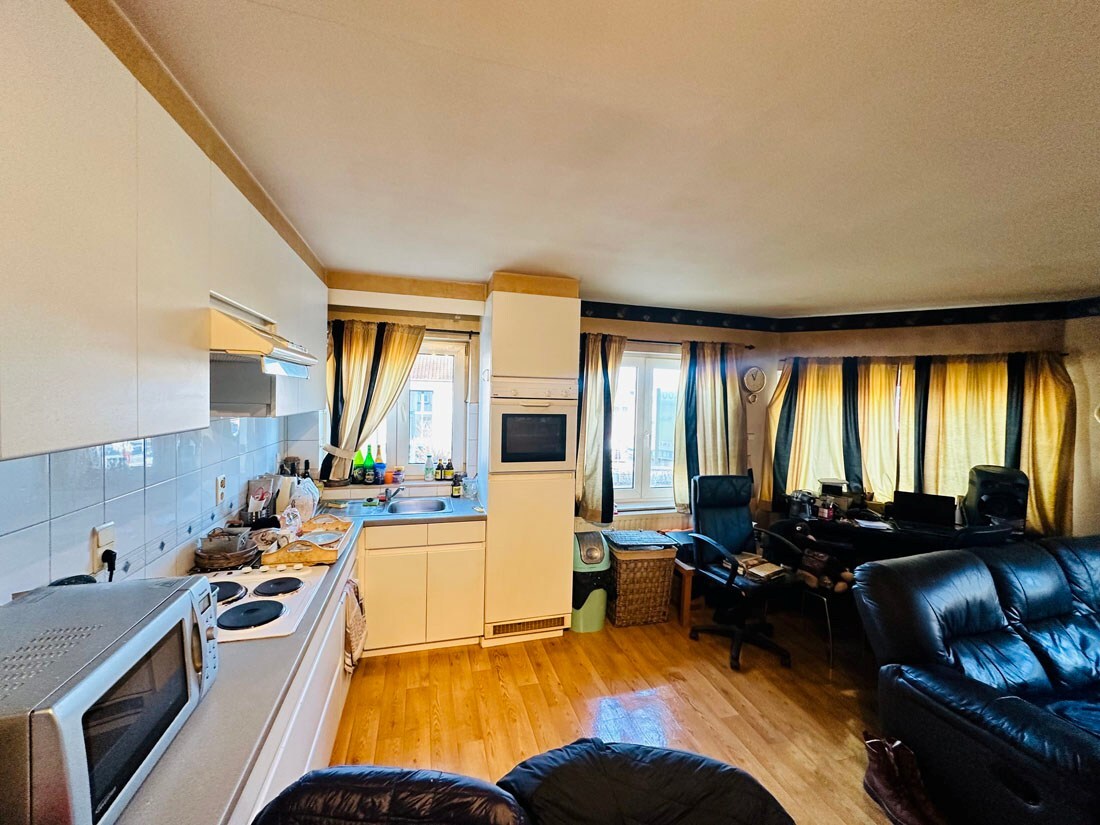 Aantrekkelijke opbrengsteigendom in het hart van Kuringen! 