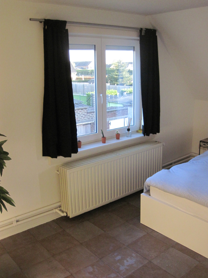 Degelijke én gezellige woning. Met tuin en met garage. 