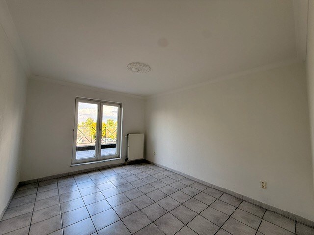 Prachtig appartement met 2 slaapkamers, terras en garage in het centrum van Dilsen 
