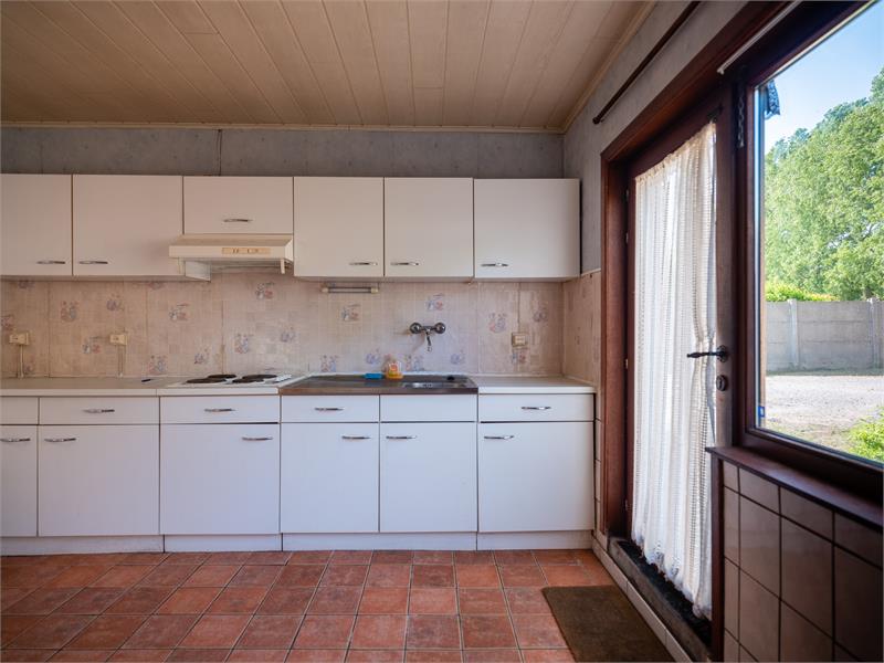 Charmante halfopen woning te Watervliet met potentieel. 