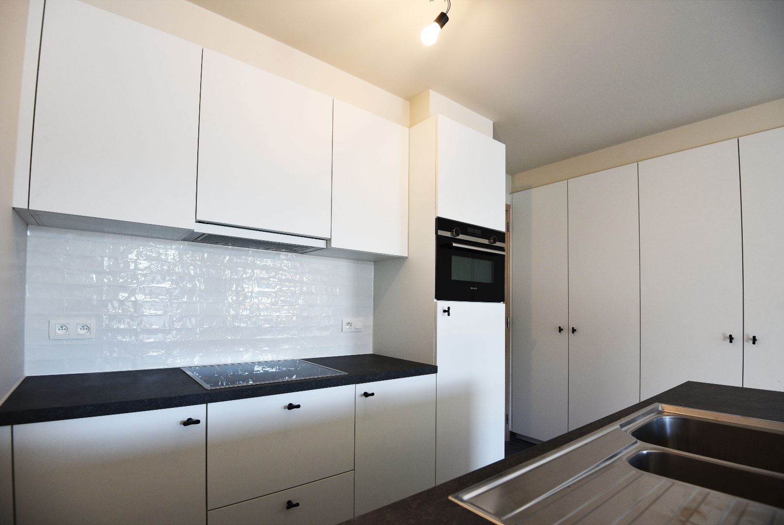 Nieuwbouwappartement, 2 slpks, autostaanplaats en terras te MALDEGEM centrum. 