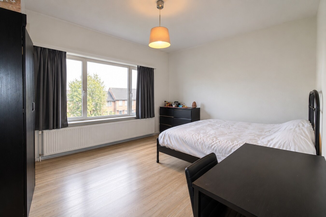 Te koop: Lichtrijk en instapklaar 2-slaapkamerappartement met terras en EPC-label C op gunstige ligging in Sint-Niklaas! 