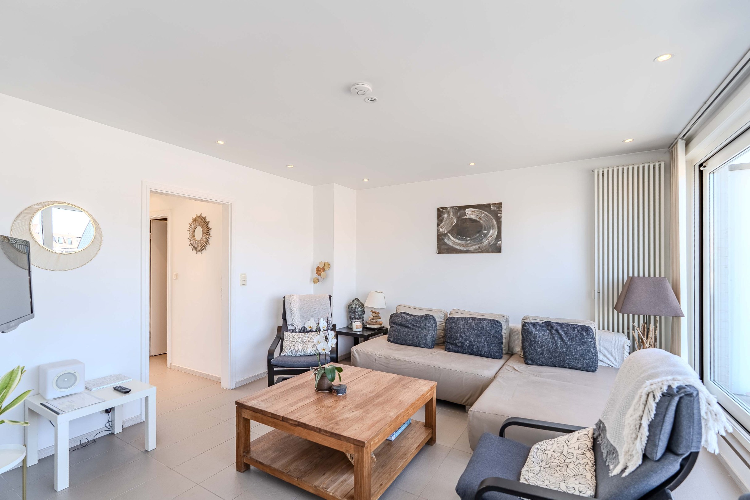 Schitterend penthouse met 2 slaapkamers, ruime terrassen en zijdelings zeezicht. 
