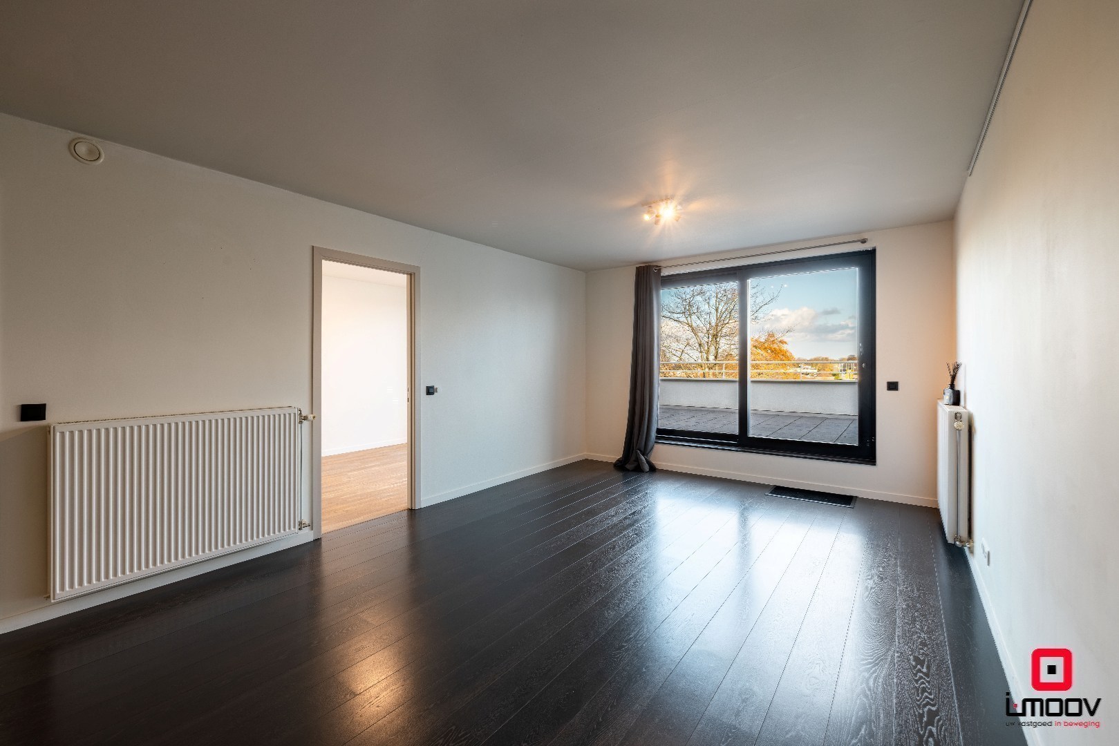 Lichtrijk en modern tweeslaapkamer appartement met groot terras in Oostakker 