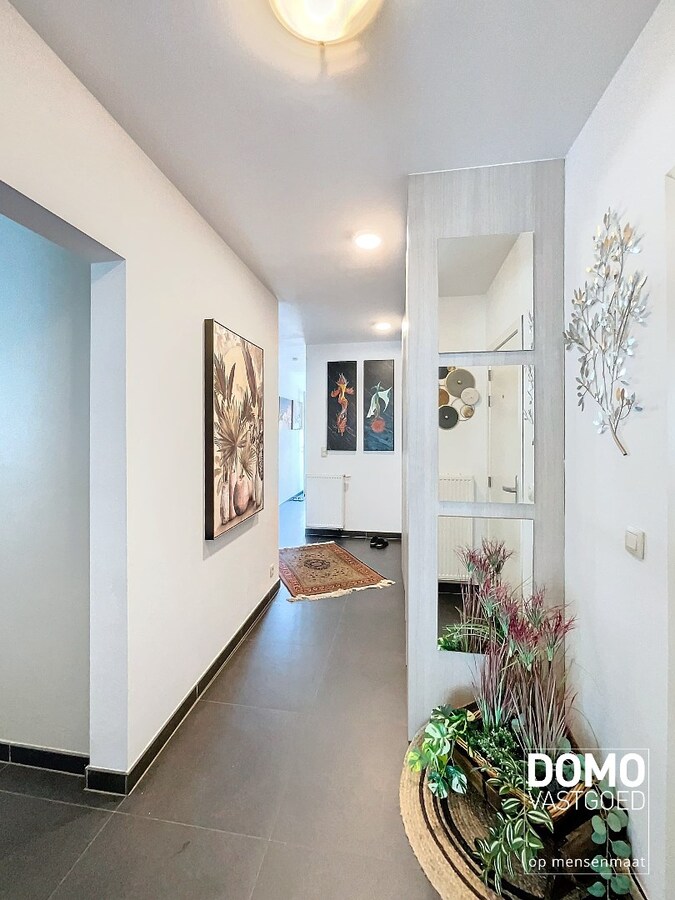 Gelijkvloers appartement met tuin en ondergrondse garage te Kermt - energielabel B -121m² bewoonbare oppervlakte 